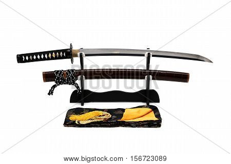 Wakizashi Japanese sword on black stand white background