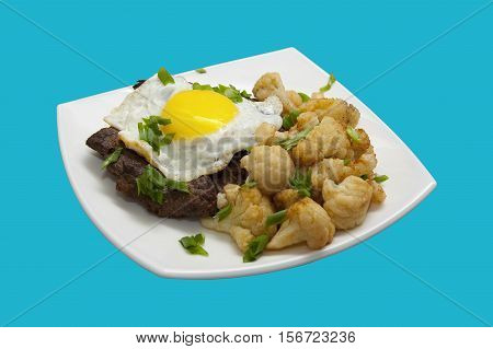 Roast beef with egg and cauliflower. Tasty food