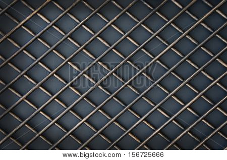 The door of forged metal lattice on gray background
