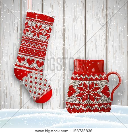 knitted christmas stocking and red tea cup decorated with traditional scandinavian patternin front of white wooden background, vector illustration, eps 10 with transparency and gradient meshes