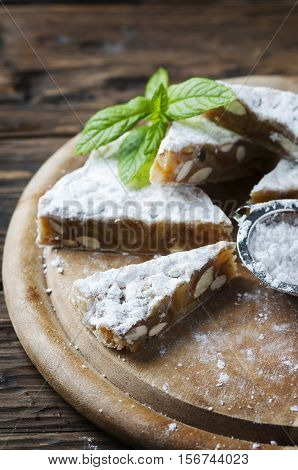 Traditional italian dessert panforte with nut selective focus