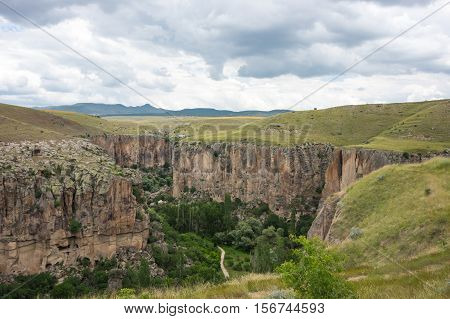 Ihlara Valley is a 16 km long gorge cut into volcanic rock in the southern part of Cappadocia Turkey