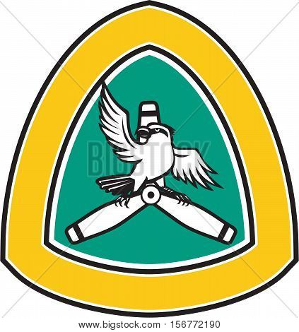 Illustration of a shrike a carnivorous passerine birds of the family Laniidae perching on a propeller blade looking to the side with spread wings viewed from front set inside shield crest on isolated background done in retro style.