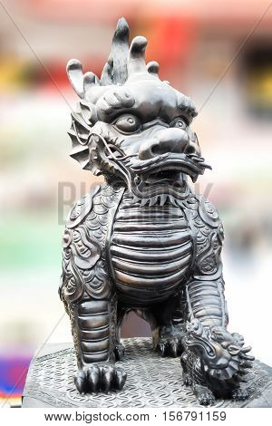 The sculpture of Dragon-headed unicorn. Thailand temple.