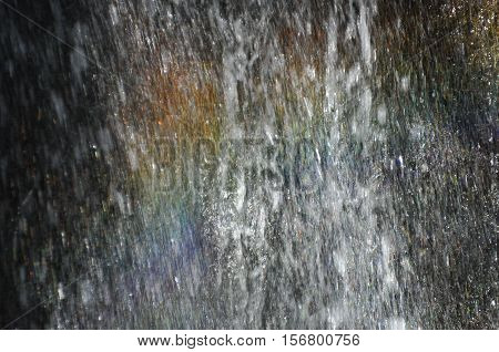 Rainbow at the waterfall Millomeris in the mountains in Cyprus