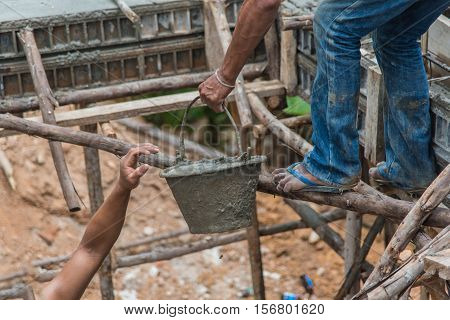 Concrete pouring during commercial concreting floors of buildings in construction(Commercial Building)