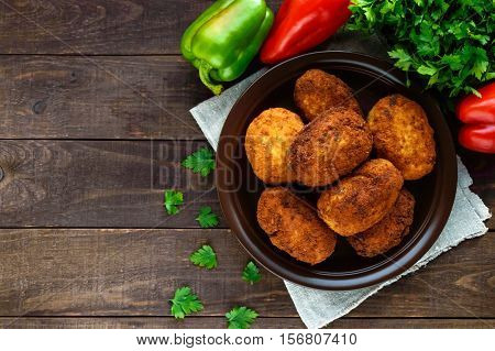 Meat mini-rolls (cutlet) with boiled egg. The top view