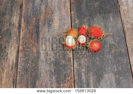 rambutan sweet fruit fresh on wood background