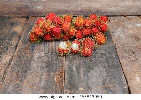 rambutan sweet fruit fresh on wood background
