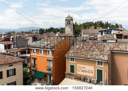 SIRMIONE ITALY - MAY 5 2016: View of Piazza Catello from the Scaliger Castle in Sirmione Lake Garda Italy
