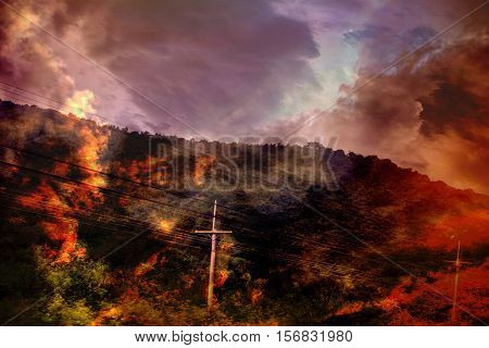 Forest fires are burning on the mountain with electric poles.