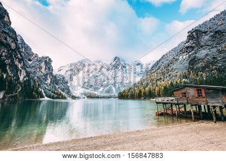 Great scene the alpine lake Braies (Pragser Wildsee). Location place Dolomites national park Fanes-Sennes-Braies, Italy. Europe. Cross processed retro and vintage style. Instagram effect. Beauty world