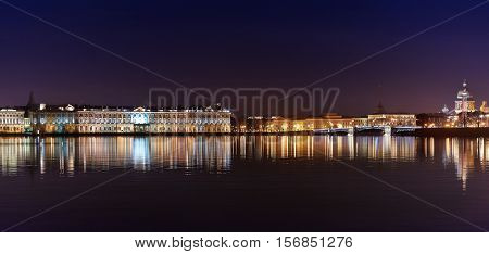 night view of the Neva river and Hermitage palace. Saint-Petersbugr.