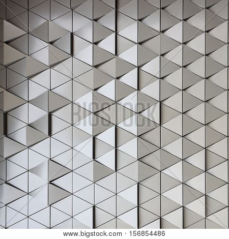 Abstract close-up view of modern aluminum ventilated triangles on facade