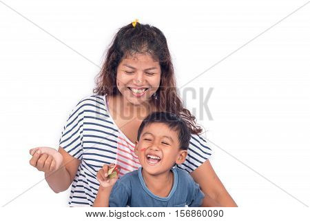 mother and son smile and laug on white background