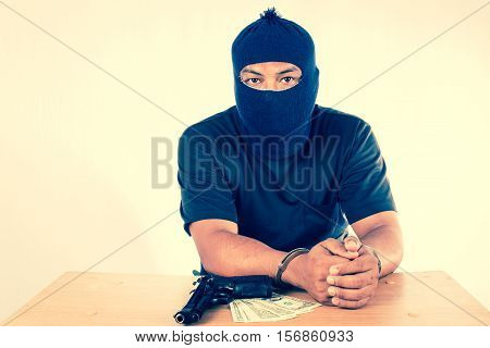 Old Photo of Young man arrested with evidence vintage tone