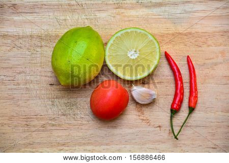 Lime, tomato, garlic and chili , herb from Thailand