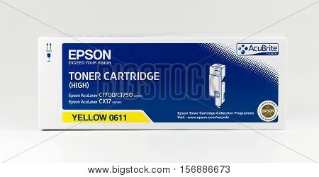 WREXHAM UK - OCTOBER 27 2016: Close up of a yellow high capacity Epson Acubrite toner cartridge for the AcuLaser C1700/1750 series and CX17 series printers on a white background.