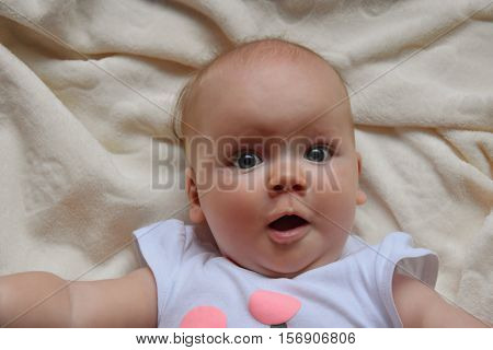 Suprised Baby With Big Eyes Photo. Beautiful Picture, Background, Wallpaper