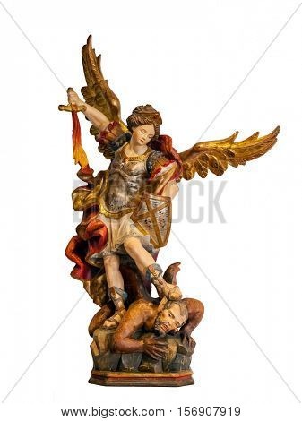 18th century Saint Michael Archangel statue created in the Baroque art style isolated on a white background