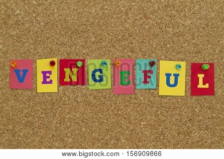Vengeful word written on colorful sticky notes pinned on cork board.