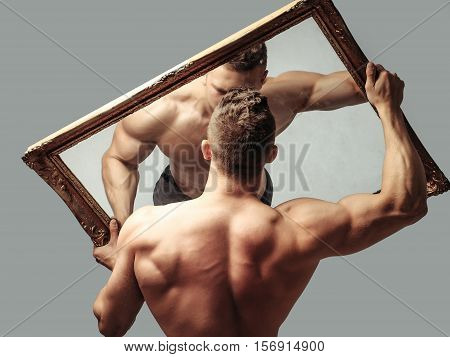 Sexy Muscular Man With Mirror