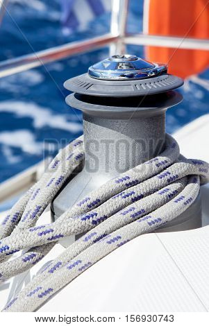 Winch with blue rope on a yacht