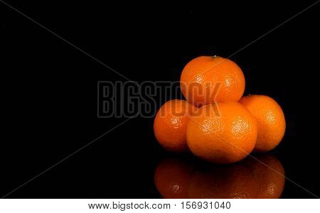 Tangerine with water splash fresh wet clear tropical