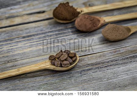 Beautiful Little Wooden Spoon With Coffee On  Background