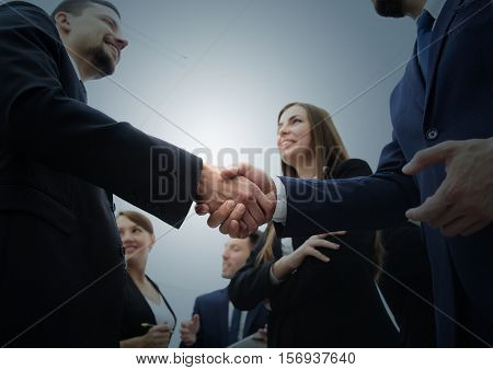 Business handshake. Business handshake and business people conce
