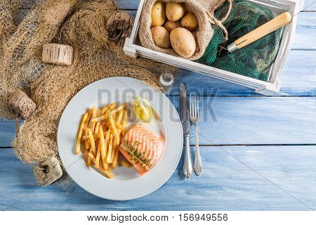 Fresh French Fries With Salmon With Lemon