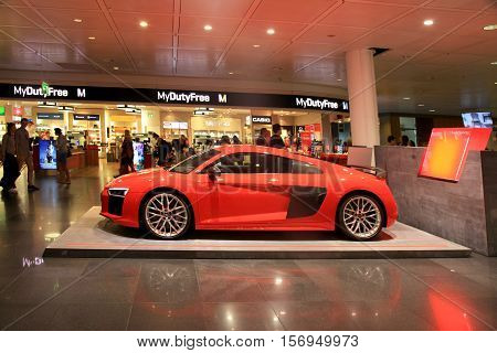 MUNICH, GERMANY - JULY 25, 2016: AUDI stand in Duty free area in Munich International Airport, Germany. The Munich Airport (MUC) Germany's second busiest airport is a major hub for Lufthansa (LH)
