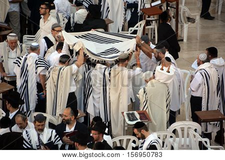 JERUSALEM ISRAEL 26 10 16: Jewish man celebrate Simchat Torah. Simchat Torah is a celebratory Jewish holiday marks the completion of the annual Torah reading cycle