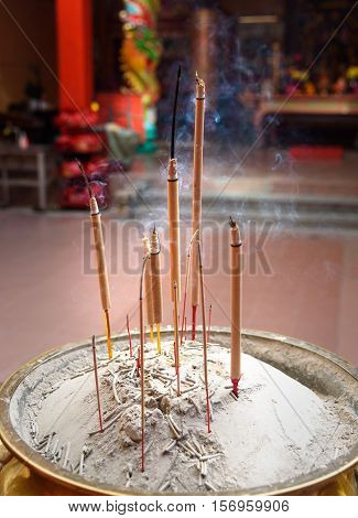 Incense Sticks In The Pot Inside Chinese Temple