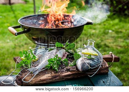 Roasting Tasty Fish With Herbs And Lemon