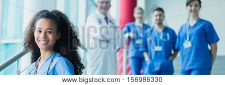Young Smiling Intern And Doctors