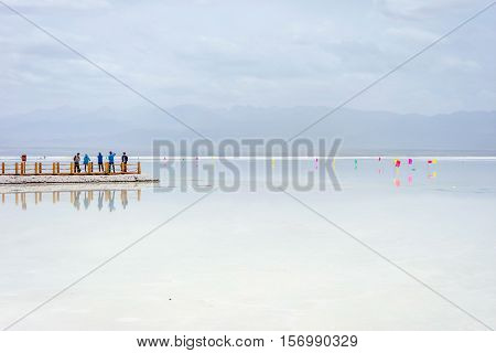 People Taking Photos At Chaqia Salt Lake, Qinghai, China