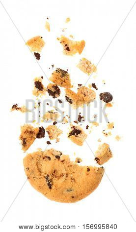Tasty cookie with chocolate chips and crumbs on white background