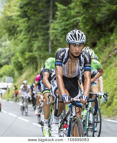 Col du Tourmalet France - July 242014: The Chinese cyclist Ji Cheng of Team Giant-Shimano climbing the road to Col de Tourmalet in the stage 18 of Le Tour de France 2014.