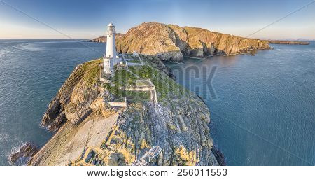 Aerial View Of The Beautiful Cliffs Close To The Historic South Stack Lighthouse On Anglesey - Wales