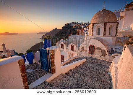 Thira, Santorini. Image Of Famous Village Thira Located At One Of Cyclades Island Of Santorini, Sout