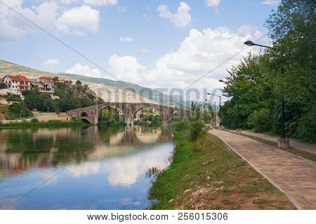 Picturesque Landscape With Old Stone Bridge. Bosnia And Herzegovina, View Of Trebisnjica River, Emba