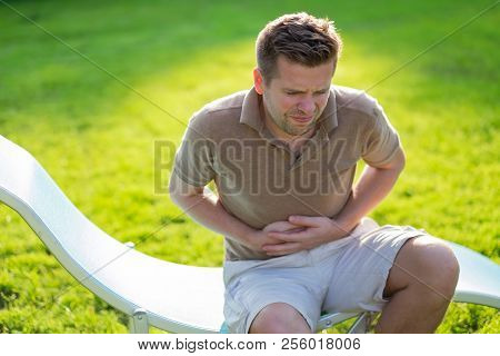 Caucasian Man Having Terrible Pain In Stomach. Diarrhea Or Gastroenteritis Health Problem.