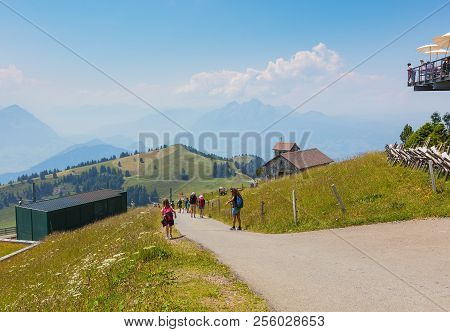 Mt. Rigi, Switzerland - July 19, 2018: People On Mt. Rigi In Summer. Mt. Rigi Is A Popular Tourist D