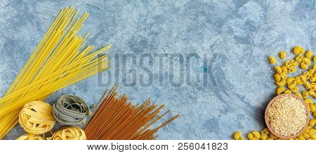 Assorted Types Of Paste On A Textured Concrete Background. Top View.
