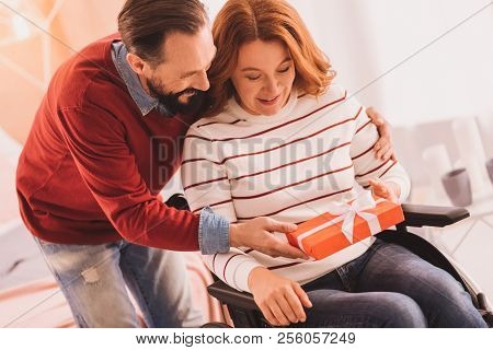 Handsome Mid Aged Man Making A Present