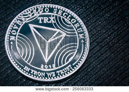 Coin Cryptocurrency Thron On A Grey Shiny Background. Trx.