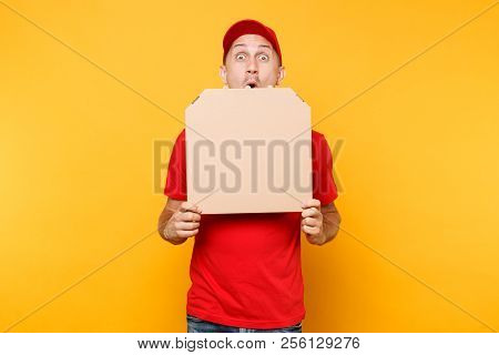 Delivery Man In Red Cap, T-shirt Giving Food Order Pizza Boxes Isolated On Yellow Background. Male E