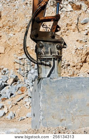 Close-up Of A Large Jackhammer In A Marble Quarry (carrara White Marble) In The Apuan Alps (alpi Apu