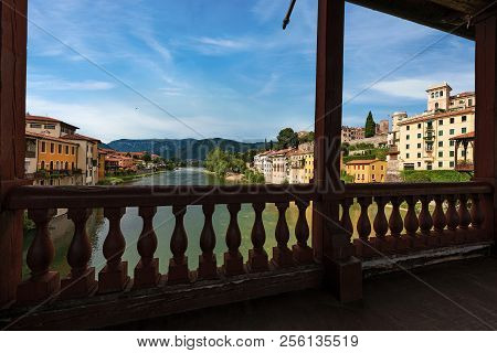 Bassano Del Grappa Town And The River Brenta Seen From The Famous Ponte Degli Alpini Or Ponte Vecchi